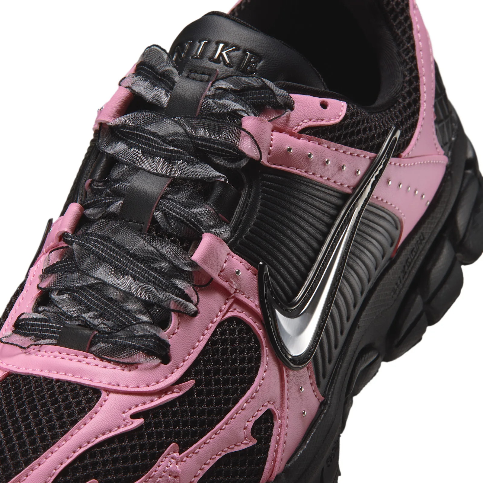 Lacing detail with sheer striped laces, silver studs and a metallic Swoosh, Black/Pink