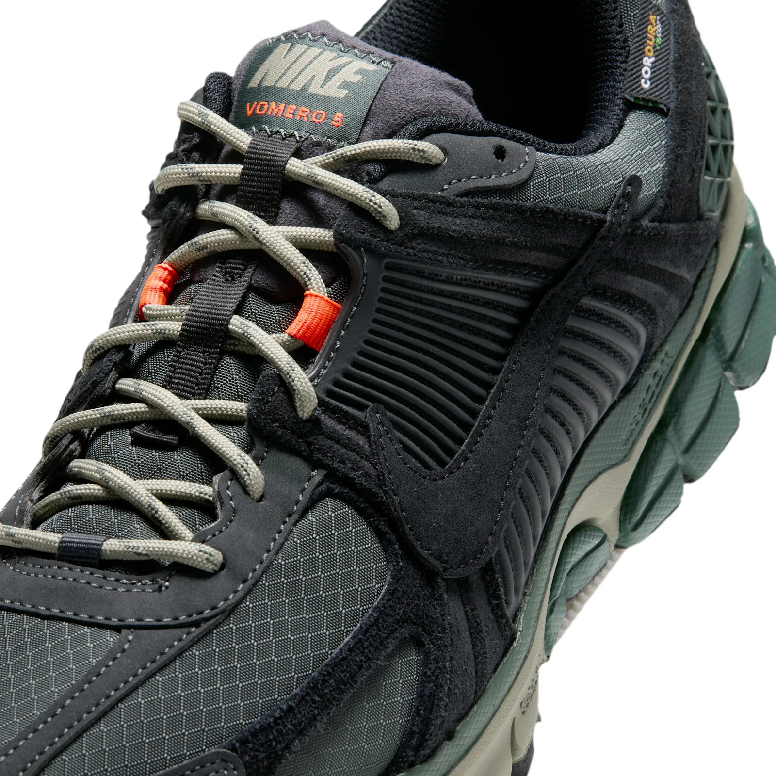 Lacing detail with olive rope laces, orange loops and a black suede Swoosh, Camo Green