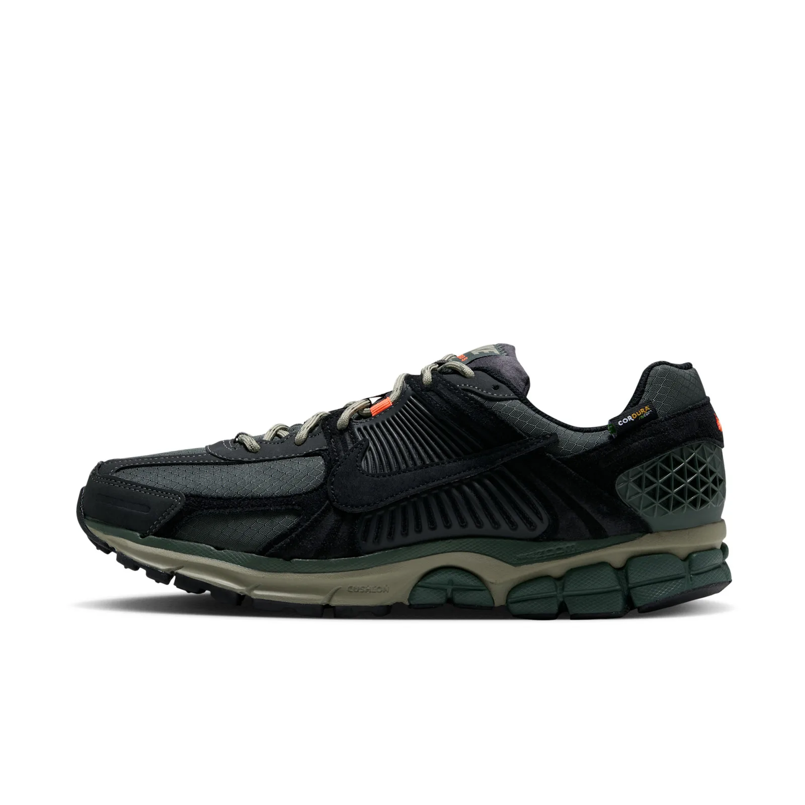 Lateral view with a black Swoosh and dark green geometric heel cage, Camo Green