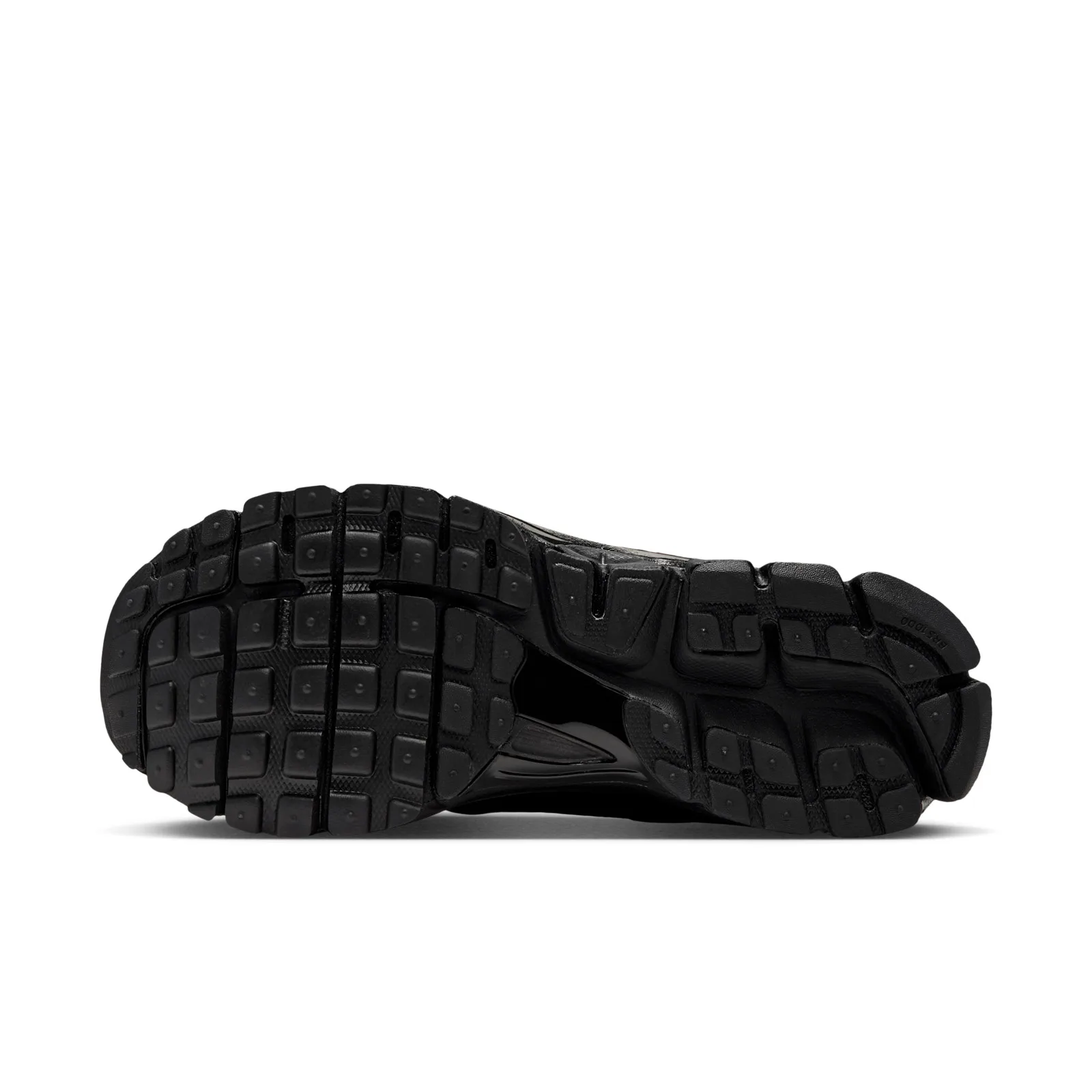 Outsole view, all-black rubber tread with square lugs and a visible split in the sole, Tortoise Shell