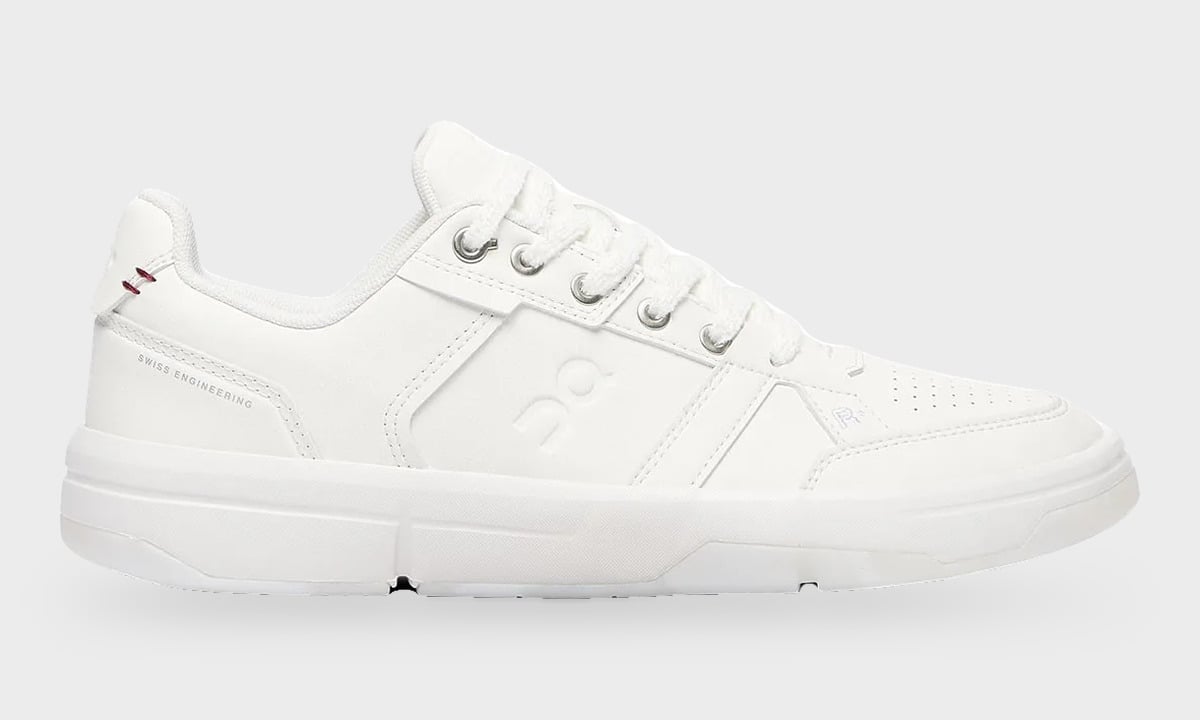 Lateral view, all-white leather sneaker with silver eyelets and embossed logo, Burna Boy Collection