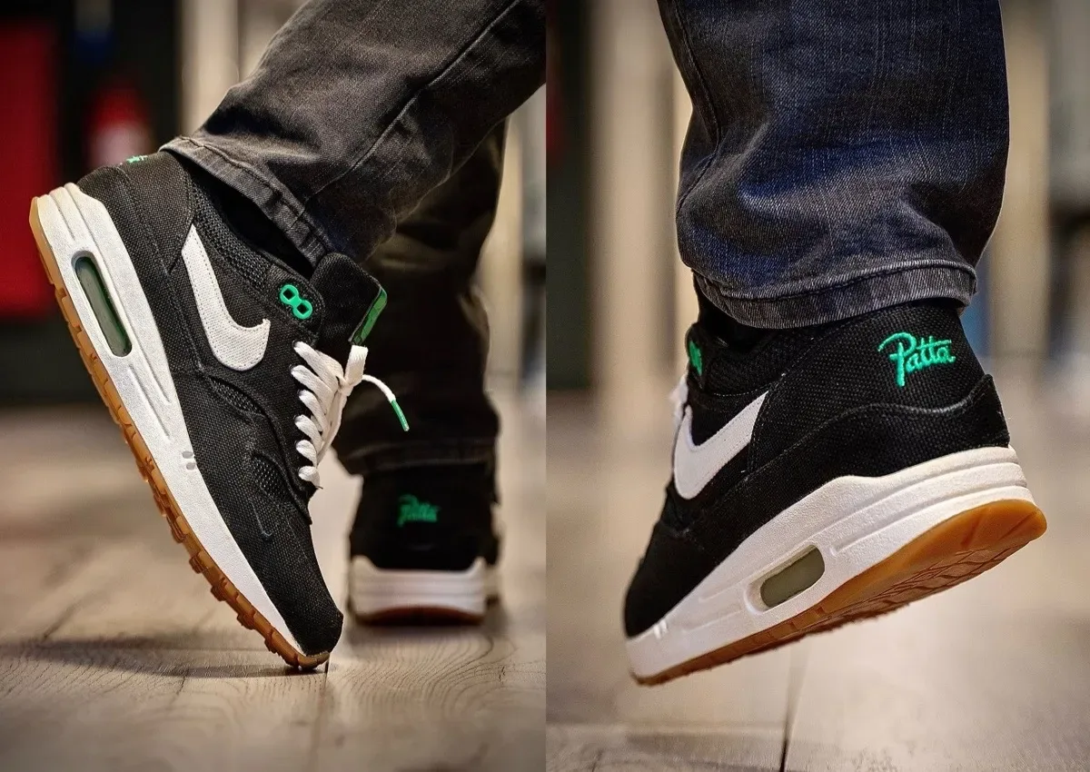 on-foot pair walking, green Patta script embroidered on heel, white laces with green tips, Lucky Green