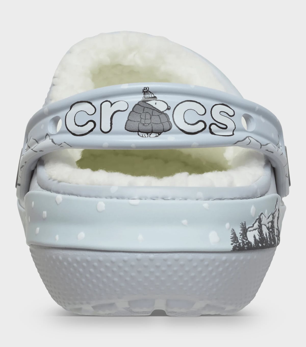 Heel view of grey clog with outlined crocs strap lettering, grey puffer figure, fleece, snow dots, Classic Lined Clog
