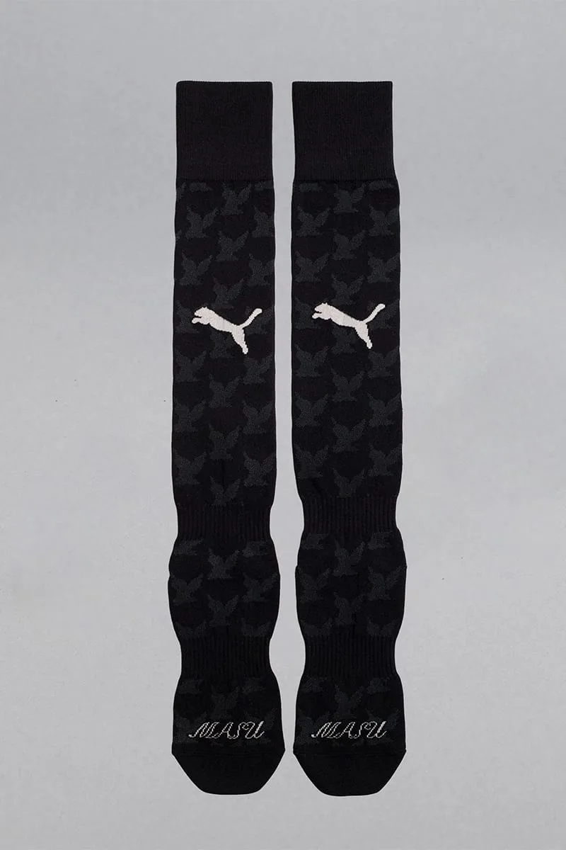 Pair of long black socks, grey bird pattern, cream cat logo, MASU script at the toes, IVORYxBLACK