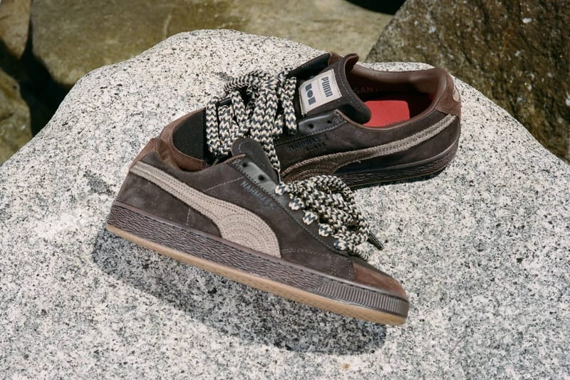 Pair in brown suede with beige crochet stripe and black-and-cream laces on speckled granite rock, NAHMIAS Suede Crochet