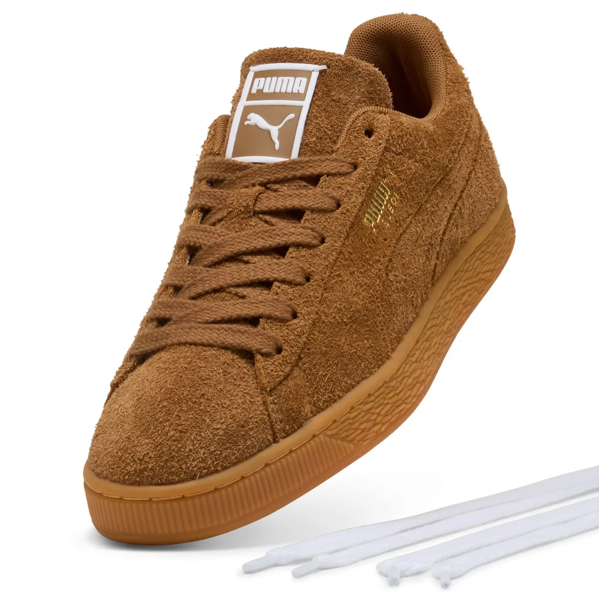 Front three-quarter view of brown suede with a gum sole and spare white laces, Forever