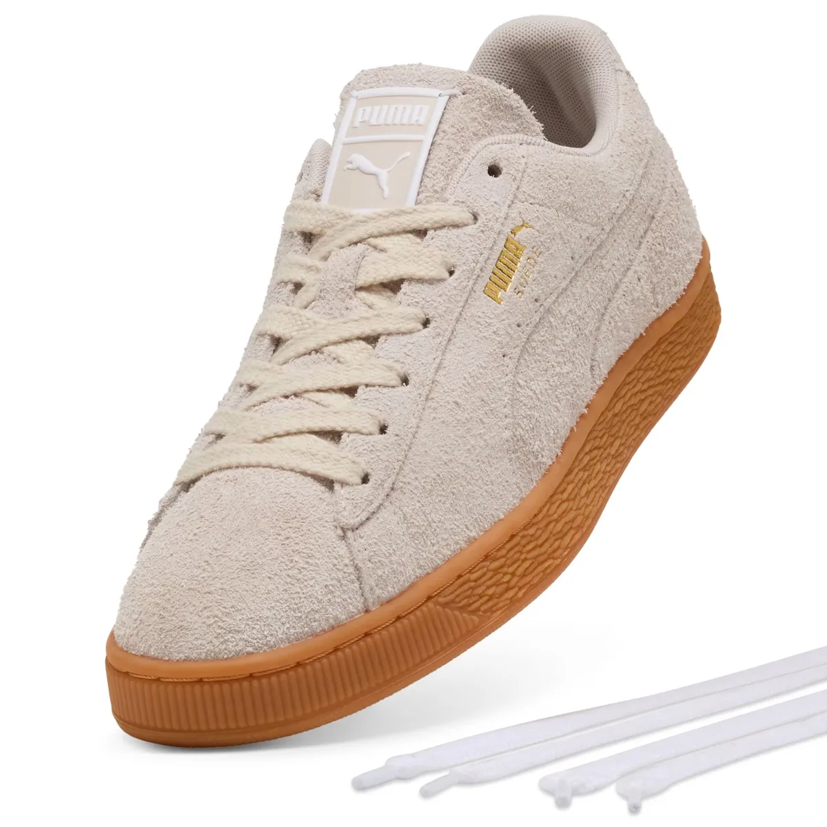 Front three-quarter view of off-white suede with a gum sole and spare white laces, Forever