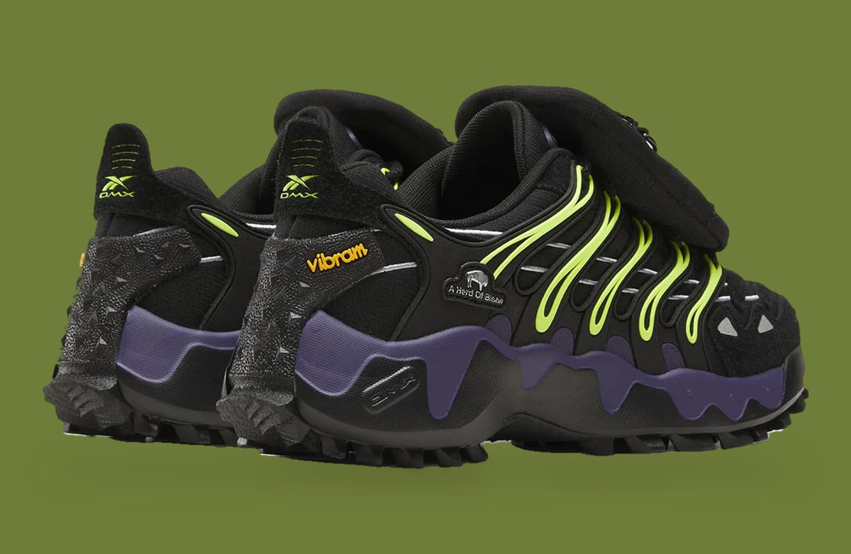 Heel and medial view of pair, DMX heel logo, orange Vibram patch, neon yellow ribs, Reebok DMX Trailzilla