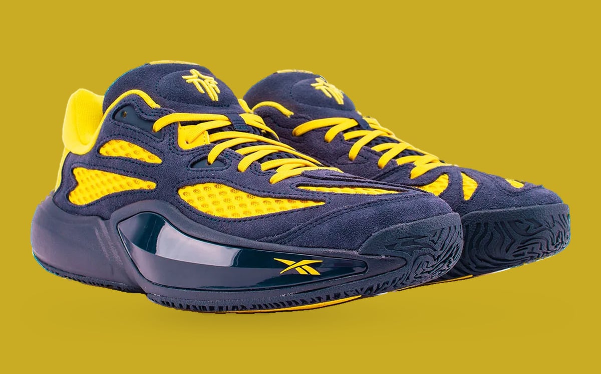 Pair at three-quarter angle, navy suede, yellow laces and embroidered tongue logo, Brew Crew