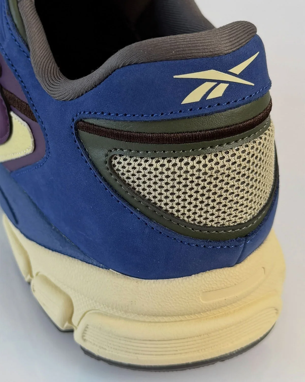 Heel detail: cream Reebok logo on blue suede, olive mesh panel and cream midsole, Purple Suede