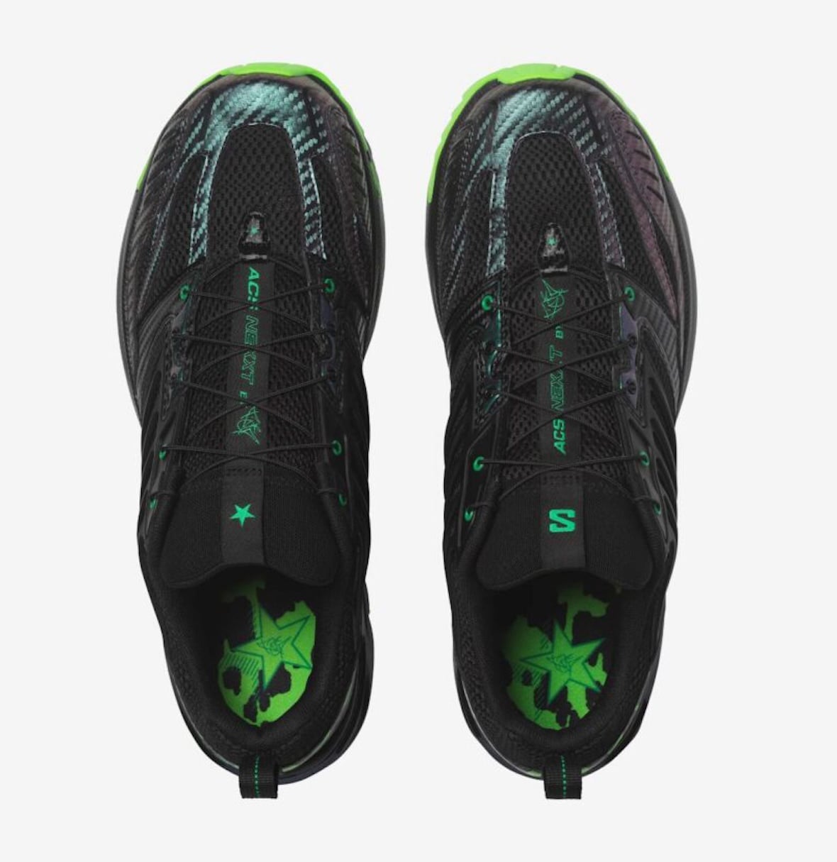 Top view of the black ACS NEXXT pair with green lettering, speed laces and bright green toe trim