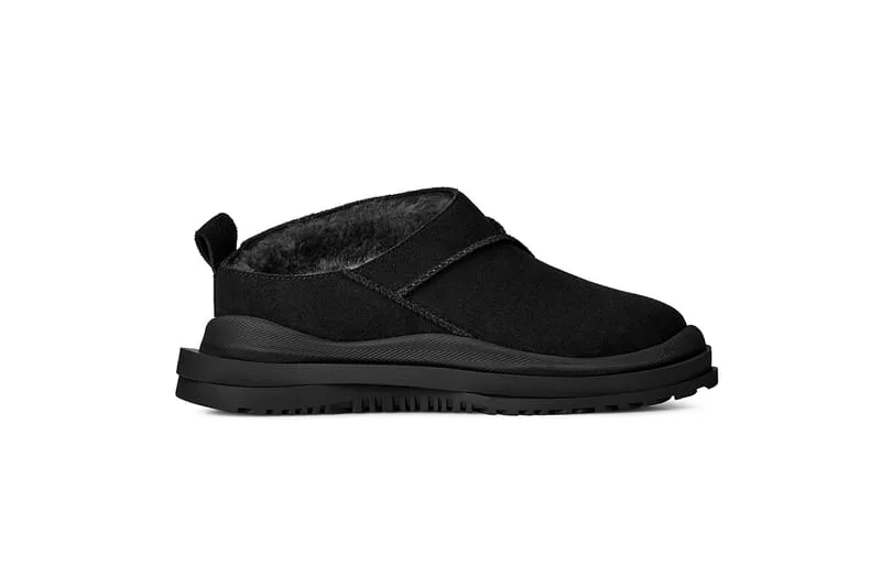 Lateral view of black suede slip-on with dark shearling lining and layered black sole, Heritage Utility Grizz
