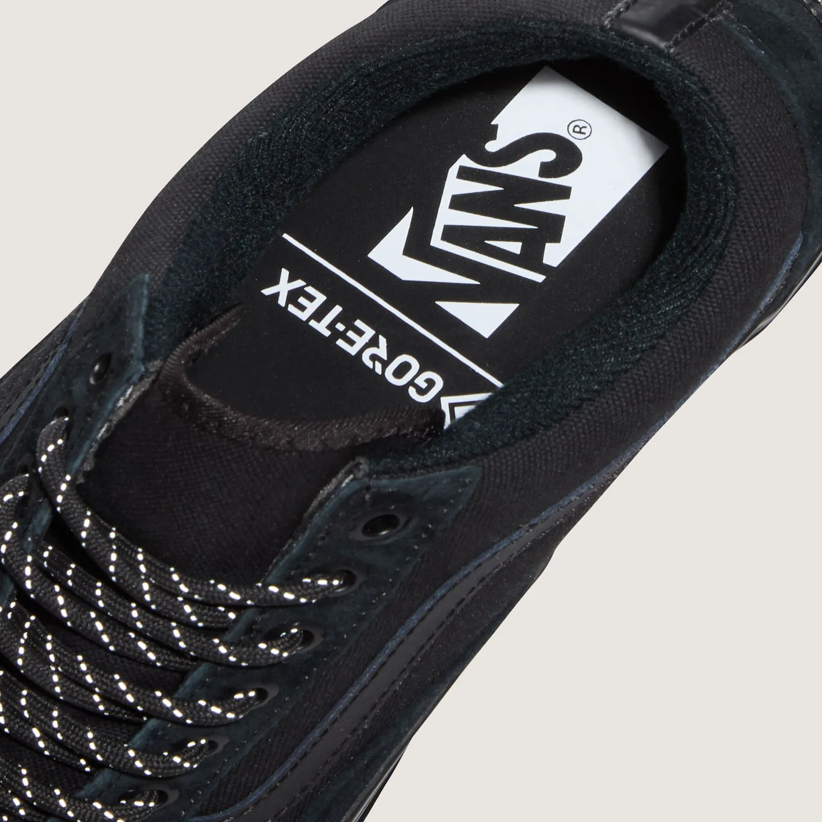 Detail of insole with white Vans and Gore-Tex logos, black suede collar, reflective-dotted laces, 36 GORE Tex
