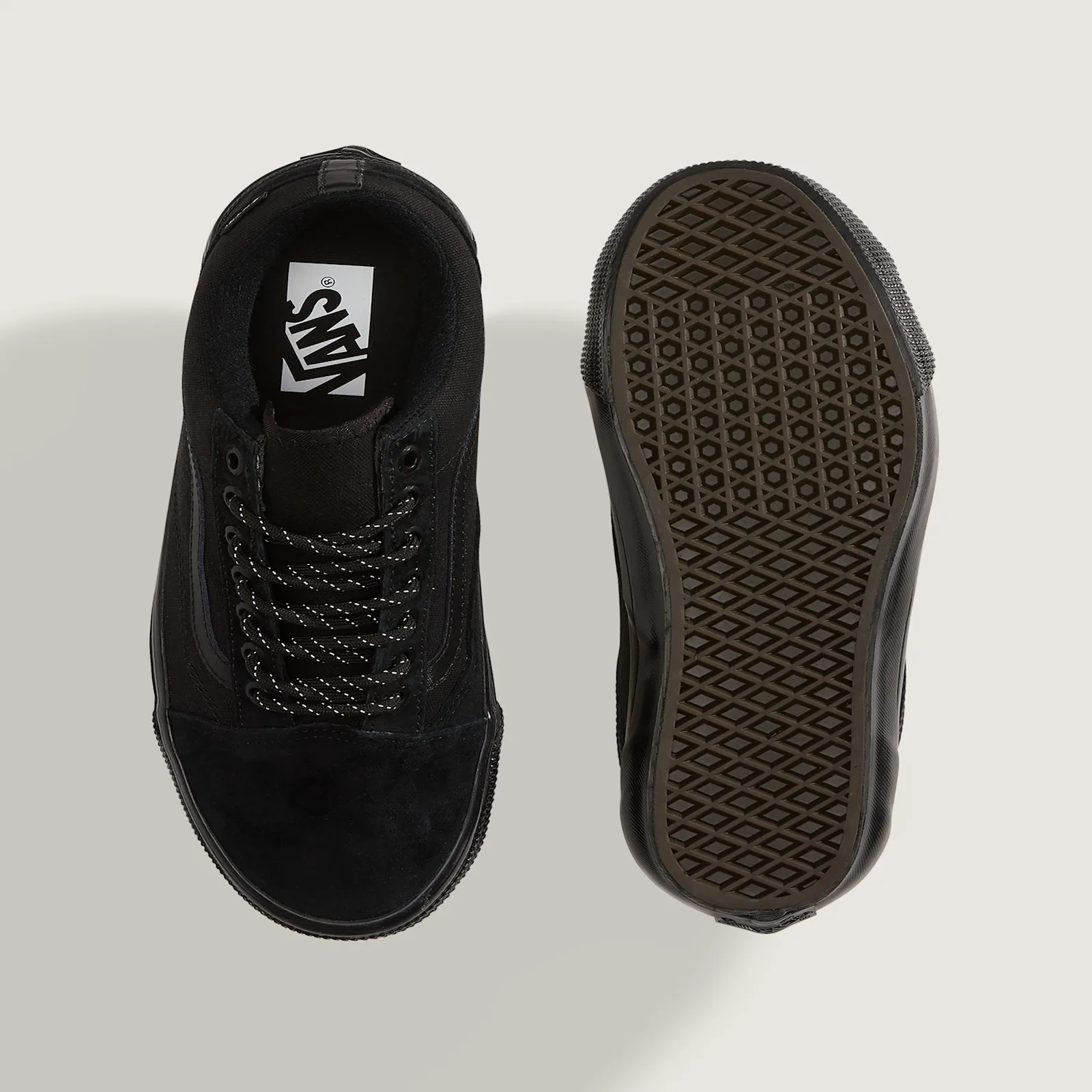 Top-down view of one shoe beside its outsole, black waffle tread and white Vans insole logo, 36 GORE Tex