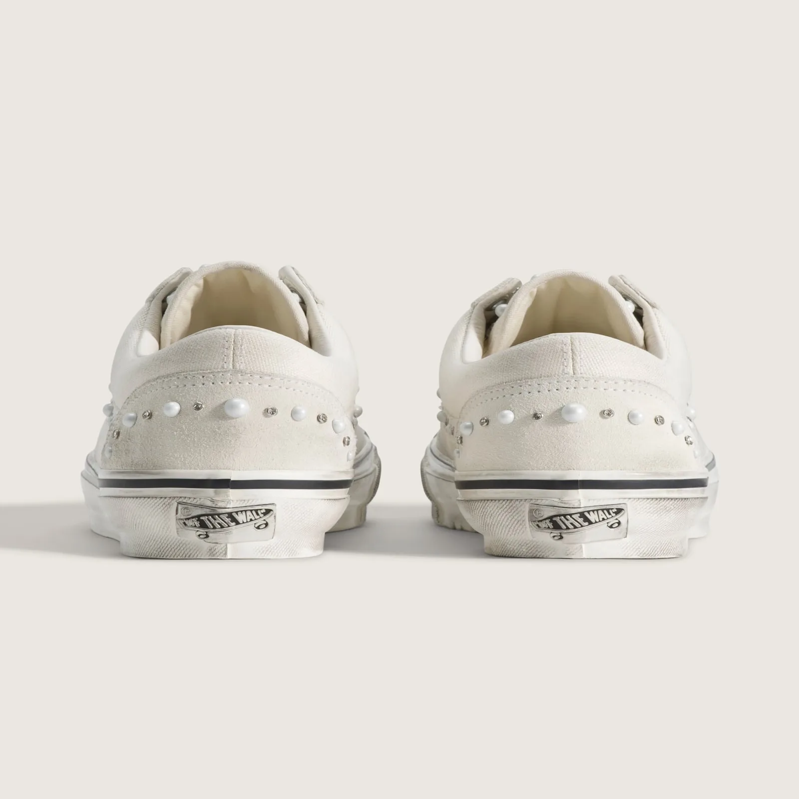 heel view of pair showing pearl and crystal studs and 'Off The Wall' sole tag, Marshmallow