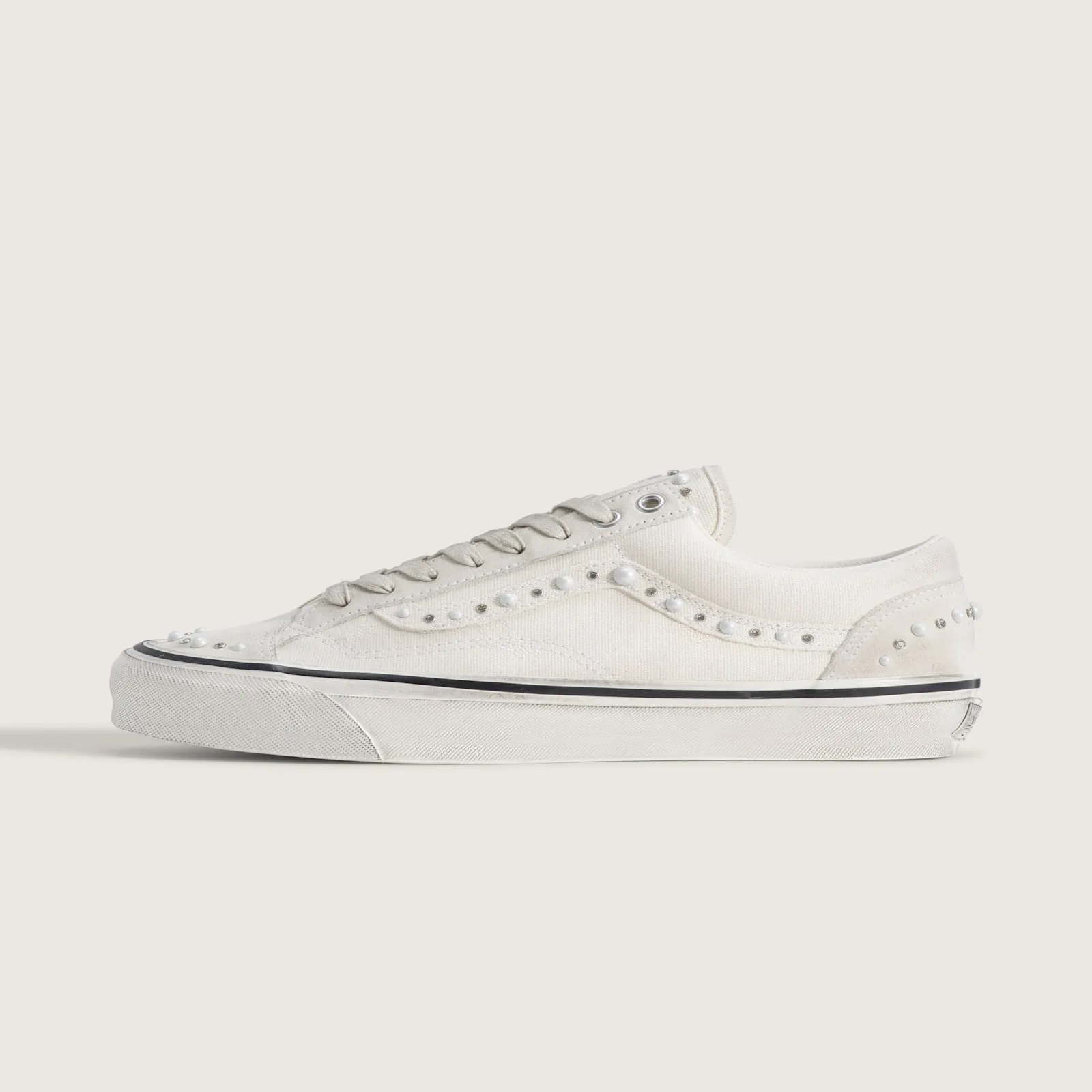 lateral side view, off-white canvas with pearl and crystal studs along toe seam, Marshmallow