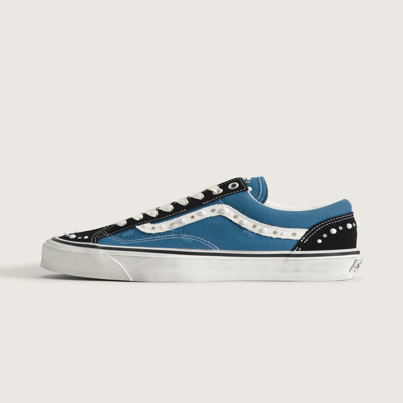 lateral view, blue upper with pearl and crystal studs on side stripe, Navy Blue
