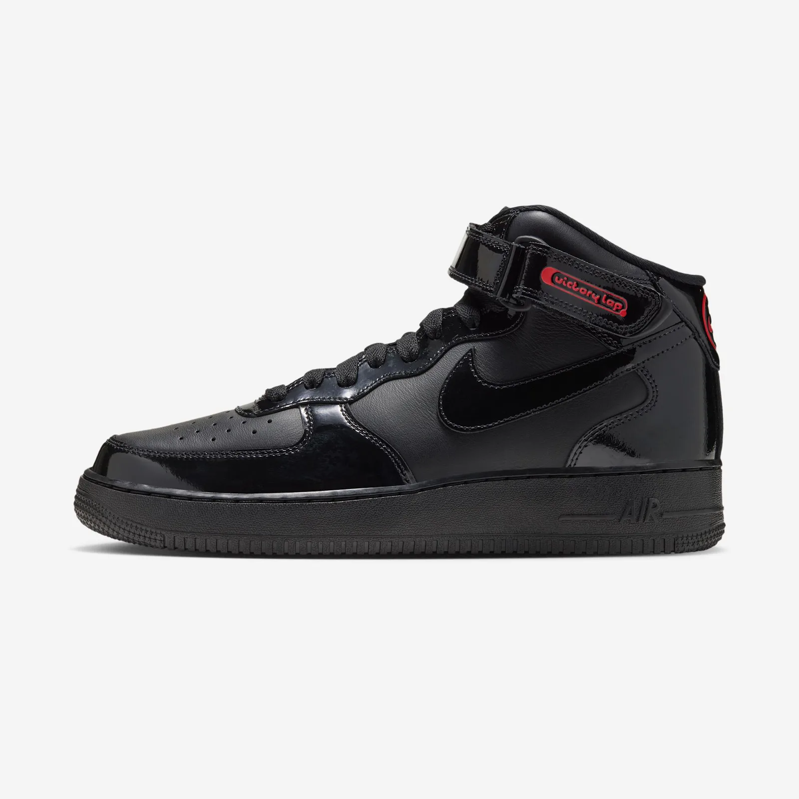 Lateral side profile on white, black patent swoosh and red Victory Lap strap badge, Black Patent