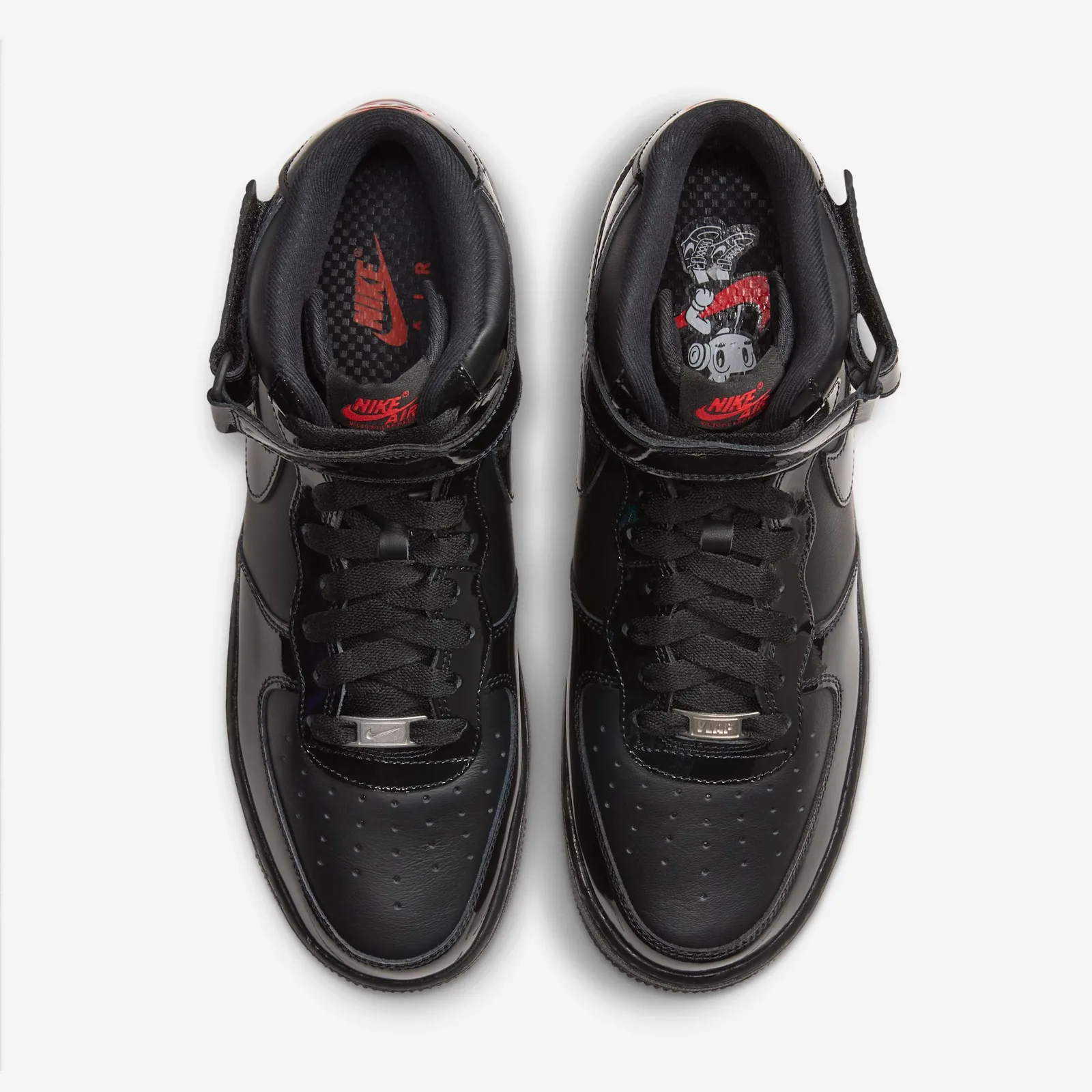 Top-down view of pair, black laces, silver lace tips and red Nike Air tongue labels, Black Patent
